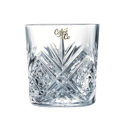 Voorzijde van Broadway Tumbler 30 cl. glas met meerkleurig CoffeeCo-logo op transparant glas.