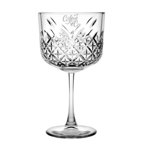 Voorzijde van gin-tonic glas met gegraveerd CoffeeCo-logo, subtiel in helder glas.